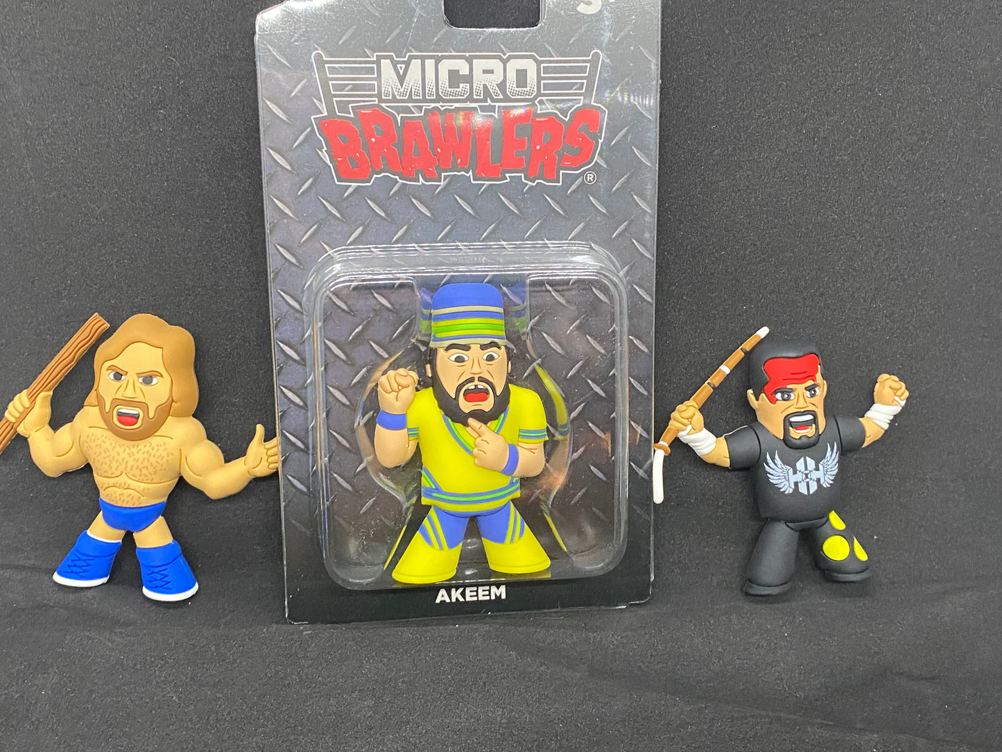 Micro Brawlers WWF Legend Akeem, WWF Legend Hacksaw Jim Duggan, and ECW Legend Tommy Dreamer